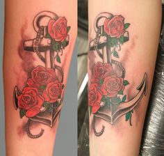 Beautiful anchor tattoo with roses. The anchor is shown to be hung at the side of the ship with red roses sprouting from all over the anchor