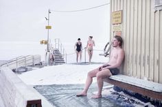 Winter Swimming in The Frozen Lake by Markku Lahdesmaki