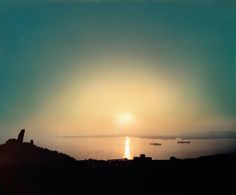 Haze veils distant Asiatic Turkey across the Dardanelles, October 1968.Photograph by James L. Stanfield, National Geographic #turkey #darda #landscape #nat #vintage #film #sunset #geo