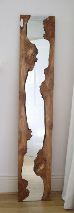 Each River Mirror is created by British artist and designer Caryn Moberly from beautiful pieces of burred elm. The mirrors resemble water fl #wood