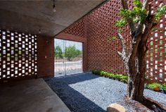 Small Brick House by Tropical Space