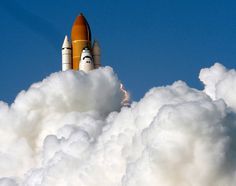 For Discovery, a farewell spin - The Big Picture - Boston.com #clouds #shuttle #sky #nasa #space #photography #rocket