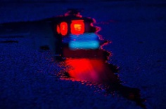 Wet Neon: Magical Reflections In Street Puddles by Slava Semeniuta