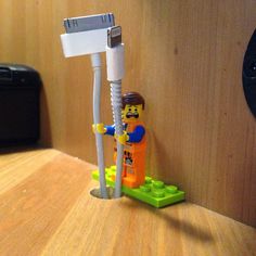 LEGO Minifigs comes to life and becomes your cable manager while adding a splash of colour to your environment. #design #product #industrial