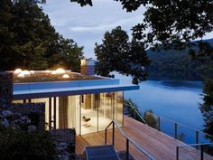 Panoramic Views Over the Lake and Openness: Lake House in Germany #germany #architecture #house #modern