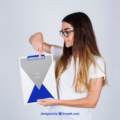 Mockup concept of young woman holding clipboard Free Psd. See more inspiration related to Mockup, Business, Template, Woman, Girl, Presentation, Glasses, Mock up, Modern, Business woman, Female, Young, Up, Concept, Clipboard, Holding, Showcase, Stylish, Showroom, Mock, Presenting and Showing on Freepik.