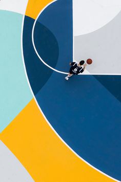 gue turns a #basketball court in #italy into a labyrinth of #lines and colors