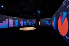 The animated infographics fill the walls of the installation at the London Design Biennale.