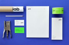Logo and stationery with fluorescent green print treatment for architecture and engineering firm Griab designed by Kollor #print #identity