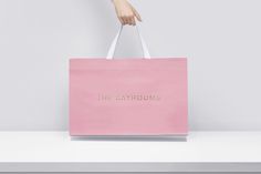 Shopping bag with pink card and gold foil detail by Two Times Elliott for Australian fashion boutique in London The Dayrooms
