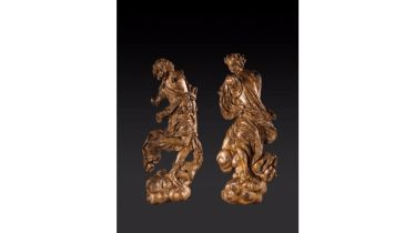 Two figures of adoring angels dressed in drapery in carved and gilded wood
