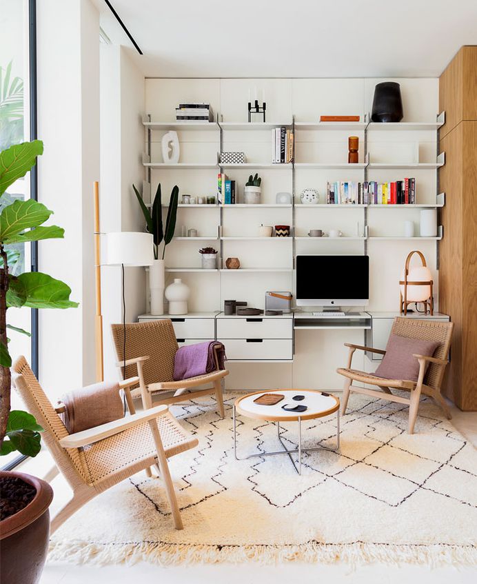 Kitchen Hidden Behind Elegant Wall Panels at Barcelona Residential Project
