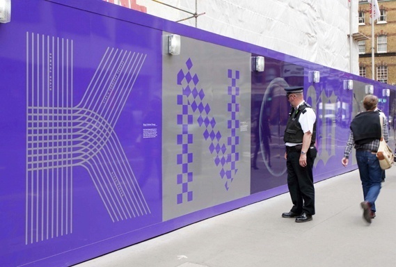 This design is clever in that it is easily viewable from far away, but passers by who are much closer to it are able to read to smaller scri #xcx