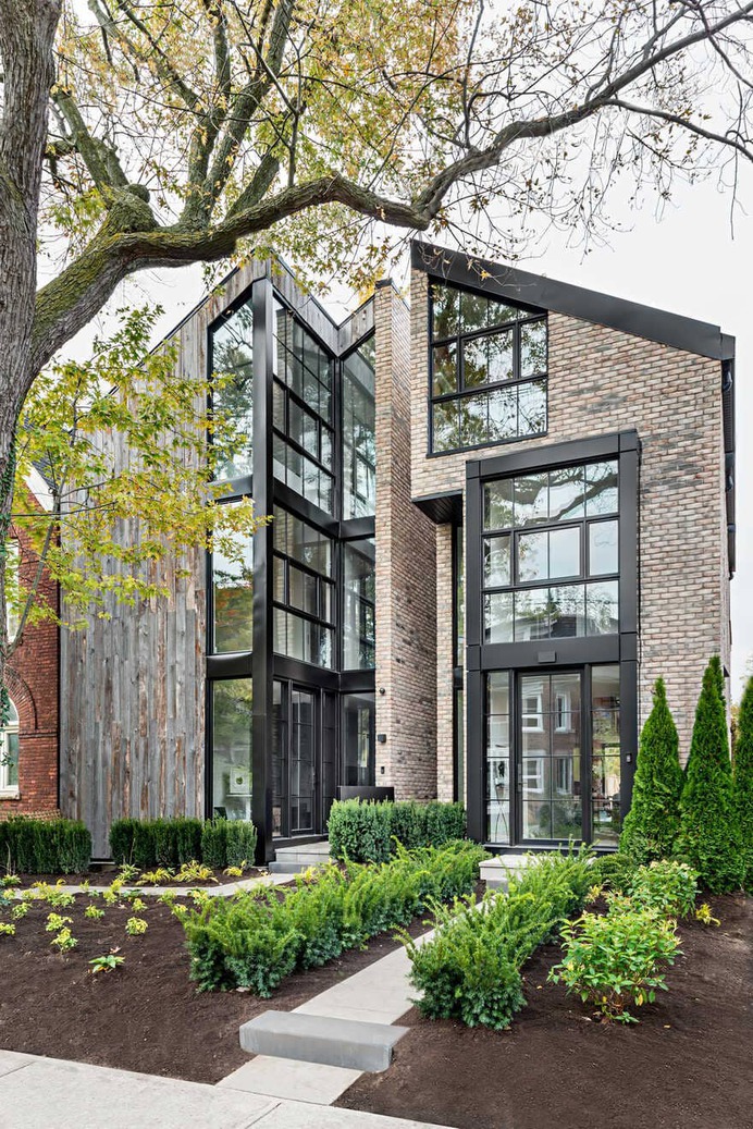 A Pair of Dilapidated Semi-Detached Houses Modernized by Ancerl Studio