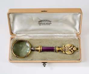 Hand-held magnifier