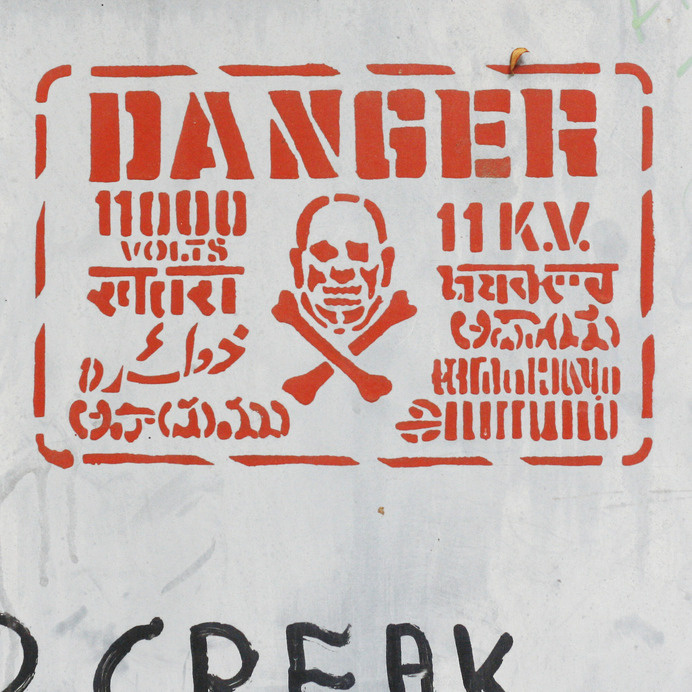 Danger sign on a transformer in Defence Colony. #sign #stencil