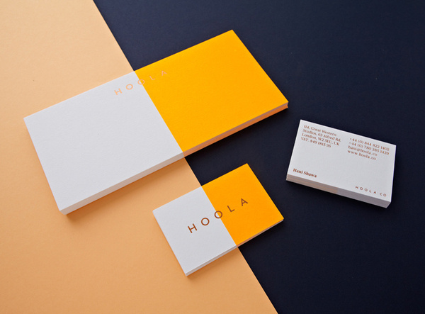 Logotype and business card with fluorescent ink and bronze foil designed by Two Times Elliott for women's swimwear brand Hoola #collateral