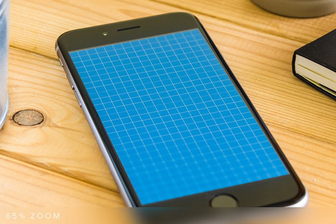 Free Realistic iPhone 6 Mockup on Wooden Table