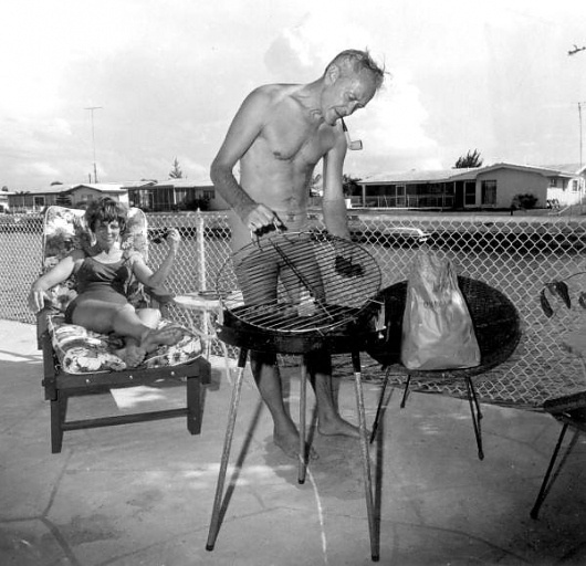 Couple outside with their grill: Cocoa Beach, Florida | Flickr - Photo Sharing! #bbq #florida #1970s #film