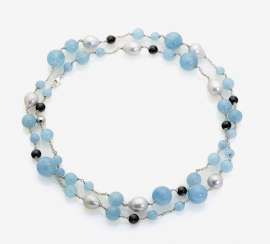 LONG NECKLACE IS DECORATED WITH SOUTH SEA CULTURED PEARLS, AQUAMARINE AND ONYX BALLS