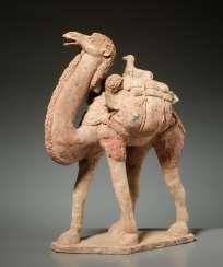 CAMEL WITH LOAD AND DOG