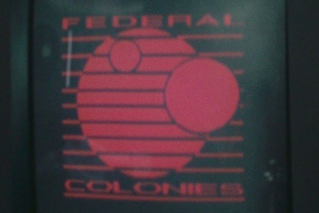 Figure 4.2 Detailed look at the Federal Colonies logo as it appears on wall display monitors.