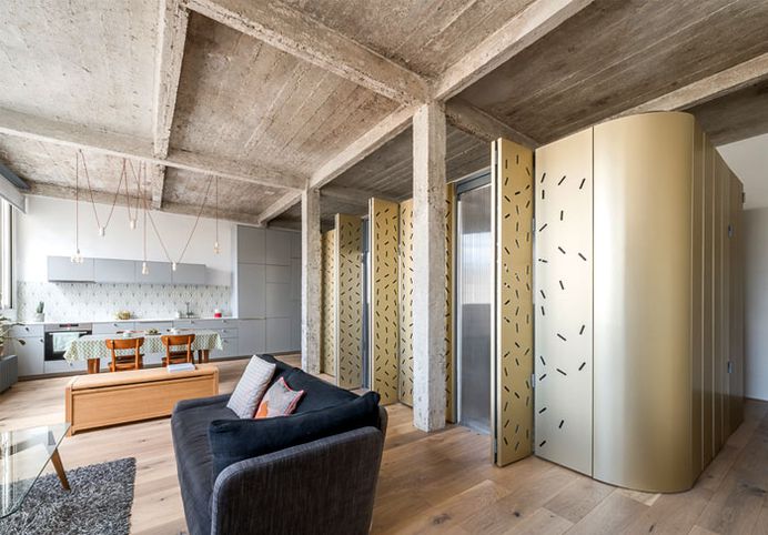 Perforated Aluminum Island at Parisian Apartment by SABO Project - InteriorZine