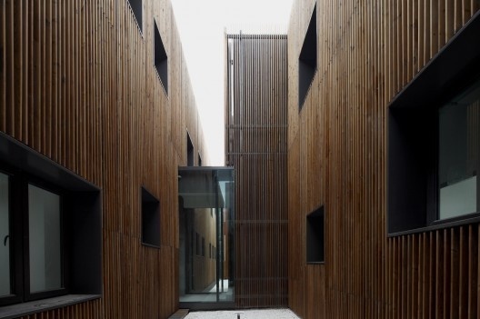 Administration Building of the North Shanghai Gas Company in Jiading / Atelier Deshaus (11) #wood #architecture #facades