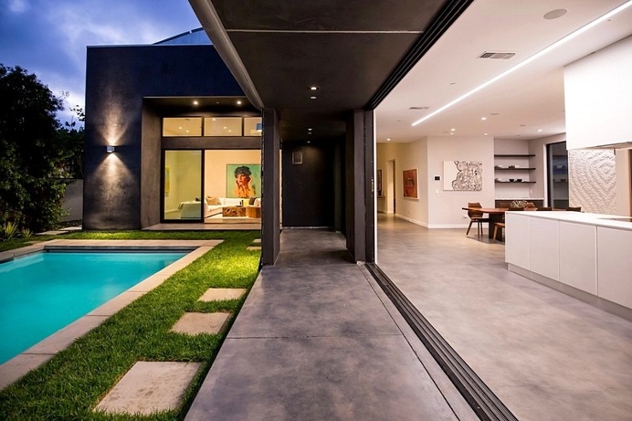 The Wave House by Mario Romano is Encased in White Aluminum