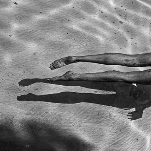 WILD THING #ripples #white #water #and #reflection #relax #paradise #black #legs #calm #photography #swim #feet