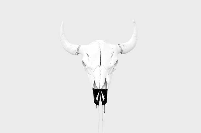 Dripping skull form Upton belts MMXV shoot by wedge and lever. #dripping #cowskull #skull #cow #sculpture #bow #arrow #whiteonwhite #art #re
