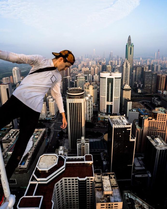Daredevil Building Climber: Roooftop Photography by Andrej Ciesielski