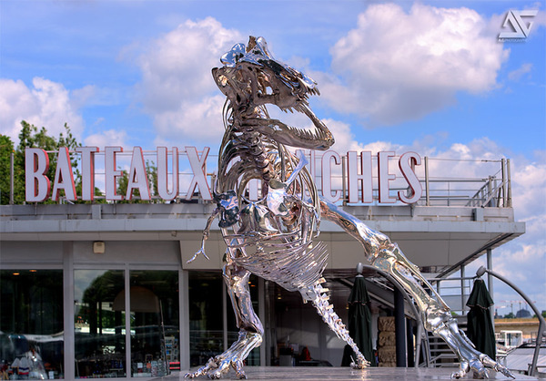 Giant Chrome T Rex Installed on the Seine River in Paris by Philippe Pasqua #sculpture #art