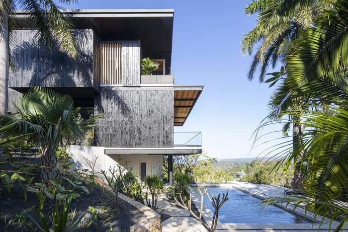 Charred Timber House Frames Views of the Pacific Ocean in Costa Rica