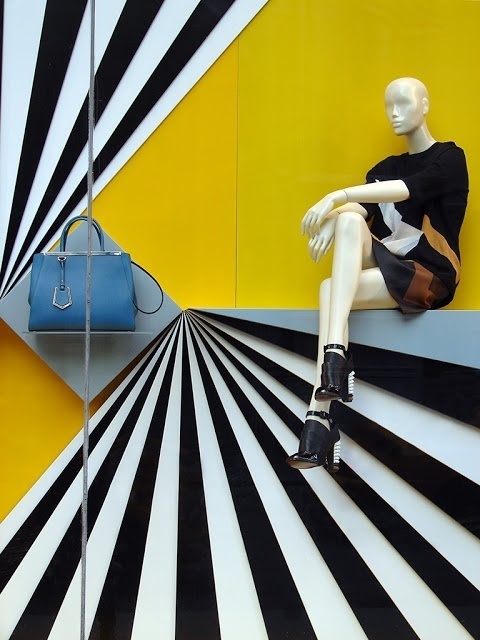 Fendi, Window Display: great use of contrast and linear eye paths... If the grey shelf holding the bag had been painted to match the yellow #pattern