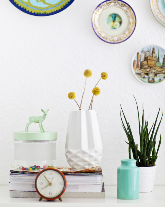 Animals on jars and plates on wall