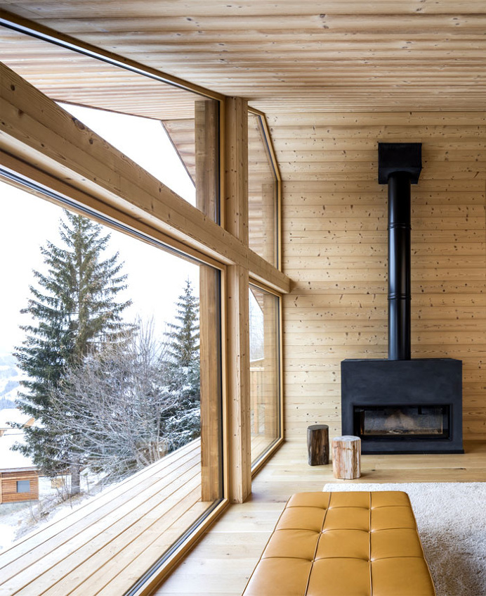 Trendy Alpine Cottage by Studio Razavi - InteriorZine