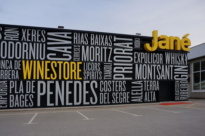 Typographic signage for a liquor store - Mindsparkle Mag Pablo Rovalo from Singular Glass designed the typographic signage and placemaking project for Jané Winestore Expo-Licor, a liquor store in Barcelona. #logo #typography #identity #branding #design #color #photography #graphic #design #gallery #blog #project #mindsparkle #mag #beautiful #portfolio #designer