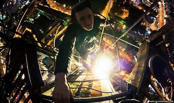 Climber illuminated by light from below #photography