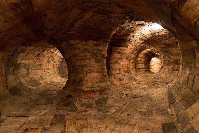Henrique Oliveira Constructs a Cavernous Network of Repurposed Wood Tunnels at MAC USP #wood #instillation