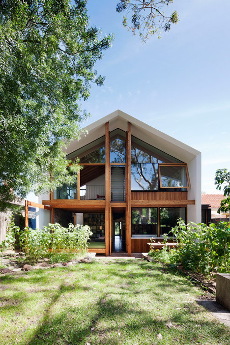 Gabled extension by BKK borrows the form of a doll's house