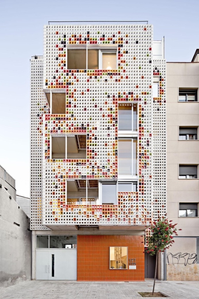 Multifamily Housing Designed with a Shiny Colorful Ceramic Facade