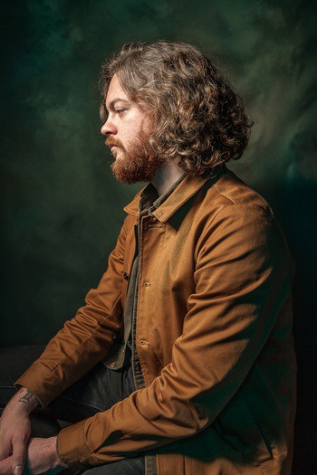 CJ Foeckler Photography | #portrait #solemn #serious #seated #profile #orange #green
