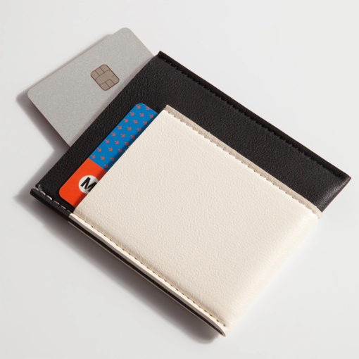 Carry only your everyday essentials with the Pocket Wallet. It features one small pocket on both the back and front of the wallet and one bigger pocket in the middle for easy access to cards, ID and a few folded cash. Made with vegan leather.