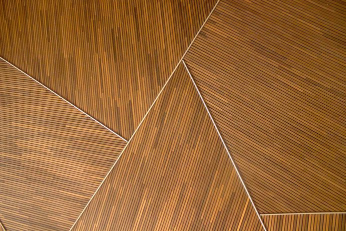 A triangle shaped wooden background texture pattern at the Shanghai Performing Arts Center