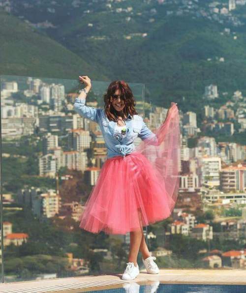 coral tulle midi skirt with denim shirt