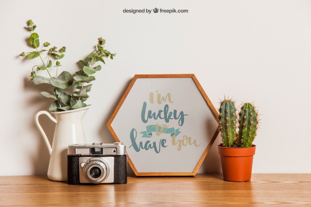 Hexagonal frame mockup on table Free Psd. See more inspiration related to Flower, Frame, Mockup, Floral, Wood, Template, Camera, Table, Floral frame, Mock up, Plant, Decoration, Creative, Flower frame, Interior, Cactus, Plants, Decorative, Wooden, Creativity, Pot, Up, Decor, Wood frame, Wooden table, Flower pot, Hexagonal and Mock on Freepik.