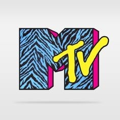 Zebra print or other print duct tape, make the M Huge and 3D, and the TV is made of cardboard, stuck to the M for even more 3D effect. Spray