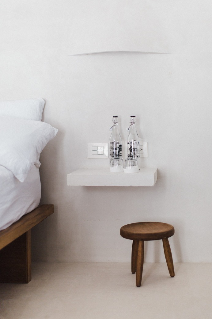 No plastic water bottles here. Awaiting guests are reusable glass bottles of Casa del Agua water (filtered and packaged in Mexico City).