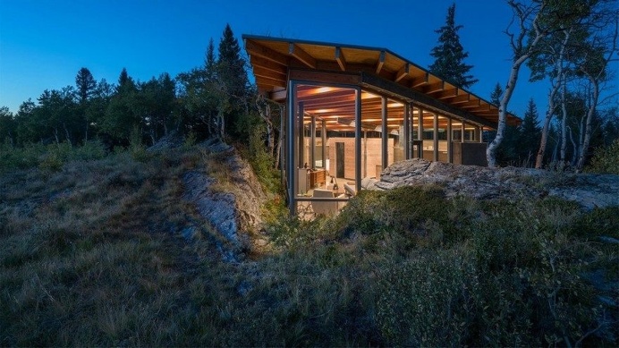 One-Bedroom Cabin Nestled Between Two Massive Lichen-Covered Rocks 7